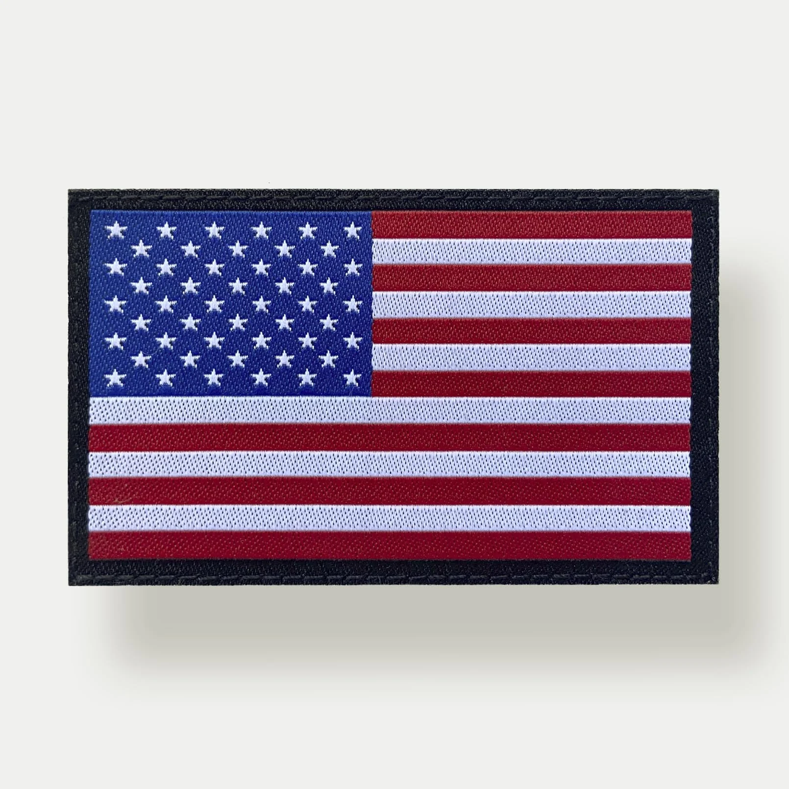 Toppa con bandiera americana colorata con 8 x 5 cm